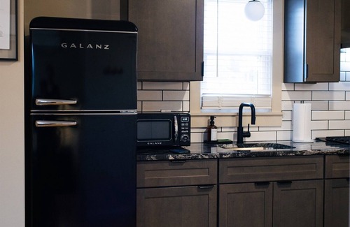 Chambersburg Cottage | The Nomad - Tiny Home at Mane + Co. with King Bed