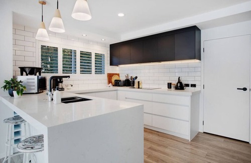Takapuna House | The Oasis Home with Hot Tub and Parking