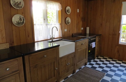 Mangonui Cottage | The old bakery cottage located on the waterfront.