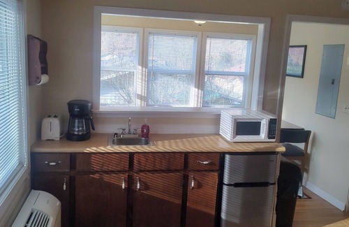 Matewan Apartment | The Overlook at Hatfield Bottom, Matewan, WV. 1 mile from Devil Anse trailhead.
