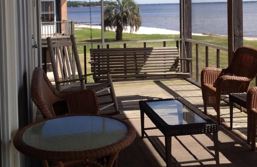 Perdido Beach House | "The Perfect Getaway" w/boat dock & water access in front & in back of house!