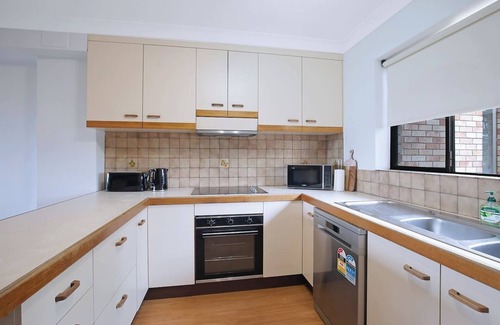 Auchenflower Apartment | The Poolside Perch A Breezy Balcony Gem
