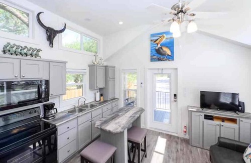 Rockport Cottage | The Rattle Trap Tiny house fenced yard