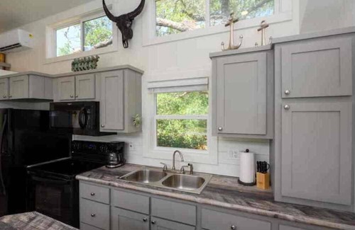 Rockport Cottage | The Rattle Trap Tiny house fenced yard