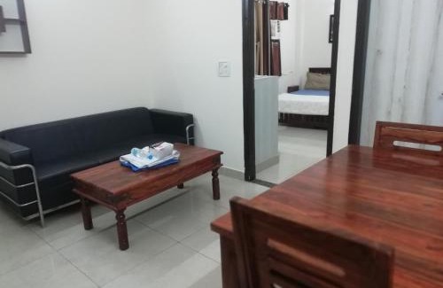 Sainik Farm House | The Raveesh E24 - 2BHK Serviced Apartment