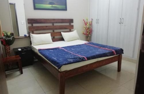 Sainik Farm House | The Raveesh E24 - 2BHK Serviced Apartment