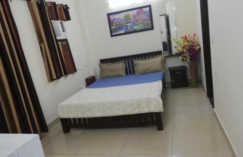 Sainik Farm House | The Raveesh E24 - 2BHK Serviced Apartment