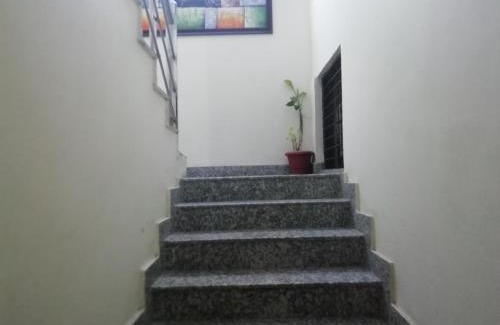 Sainik Farm House | The Raveesh E24 - 2BHK Serviced Apartment