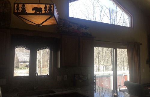 Harbor Springs Ski Chalet | The Reside on Vail features ski in ski out from Nubs Nob private locker room
