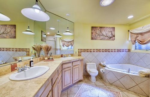 Waynesville Bed & Breakfast | The Rhododendron House is a spacious cottage in Waynesville, NC. It is ideal for families traveling with younger and older children and longer term stays. This open floor plan, 1000sq foot cottage is a stand alone building and has ample space to spre