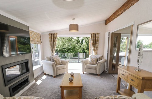 Rhyd-y-clafdy Cottage | THE RIVENDALE LODGE, pet friendly, with pool in Pwllheli