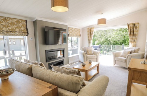 Rhyd-y-clafdy Cottage | THE RIVENDALE LODGE, pet friendly, with pool in Pwllheli