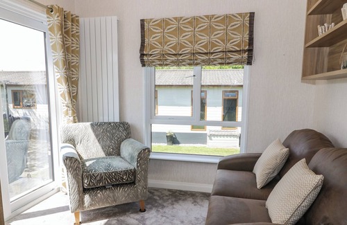 Rhyd-y-clafdy Cottage | THE RIVENDALE LODGE, pet friendly, with pool in Pwllheli