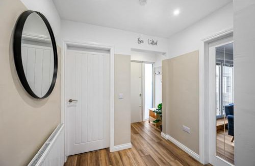Dundee Villa | THE SCHOOL HOUSE, DUNDEE- 3 bed bungalow TV's in all rooms, 2 double rooms and one queen size where the bed can be split into 2 twin beds, 2 bathrooms, fully equipped kitchen, FREE off street parking, WiFi, long stay rates available with HONEYCOMB HOSTS