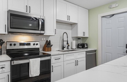 Cocoa Beach Apartment | The Shark Tank: Margaritaville, Steps to Beach, Shops & Downtown Cocoa Beach