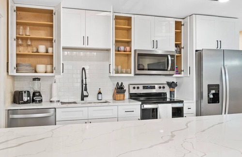 Cocoa Beach Apartment | The Shark Tank: TownCenter, Walk to Ocean, Bars, Shops & Downtown Cocoa Beach