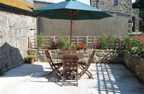 Treen House | The Shippen, near Pedn Vounder, granite barn in the heart of Treen, sleeps 4