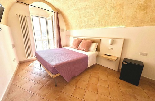 Matera Hotel | The Smile of the Sassi Rooms. Idris Superior Deluxe on Sassi view.