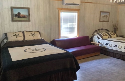Bryson Cabin | The Stage Coach Cabin is a rustic cabin that sleeps 4.