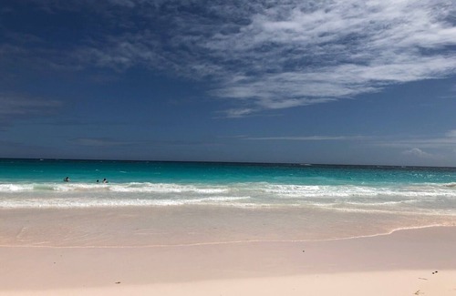 Dunmore Town Apartment | The Sugar Apple Studio 3 minute walk to the beautiful Pink Sand Beach