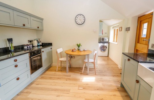 Maesbury Marsh Cottage | THE TRACTOR SHED, pet friendly, character holiday cottage in Oswestry