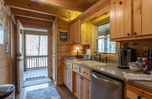 Saluda House | The TrainStation | Secluded Cabin with Large Deck, Waterfall, & Hot Tub!