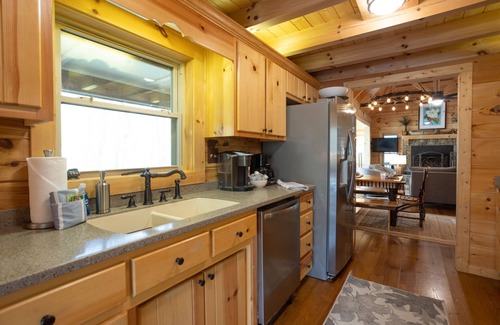 Saluda House | The TrainStation | Secluded Cabin with Large Deck, Waterfall, & Hot Tub!