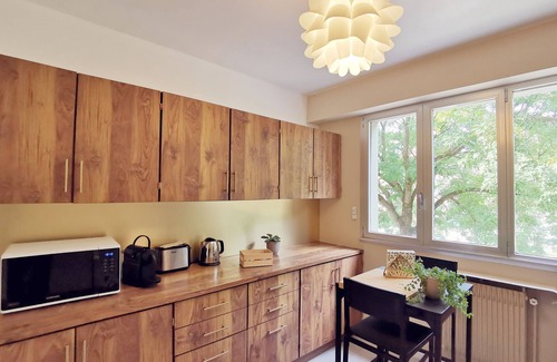 Belfort Apartment | The tree-lined quays
