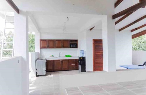 Aburi Apartment | The Treehouse Studio apartments with a large rooftop terrace.