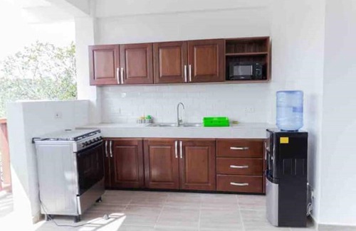 Aburi Apartment | The Treehouse Studio apartments with a large rooftop terrace.