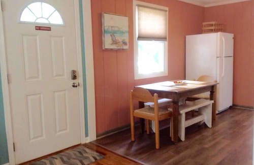 Michigan City Cottage | The Yellow House Near the ShorenWalking distance to Sheridan Beach,