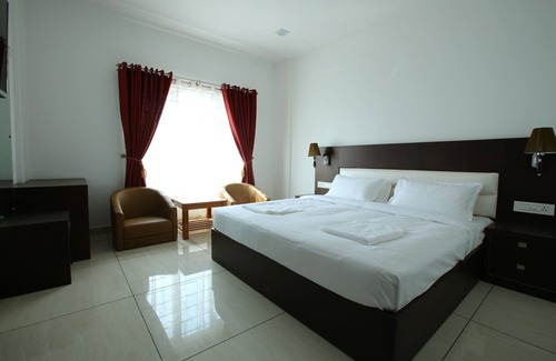 Thalassery Hotel | THEERTHA INTERNATIONAL