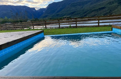 Praia Grande Ski Chalet | Theme Chalets with heated pool at the foot of the Malacara Canyon.