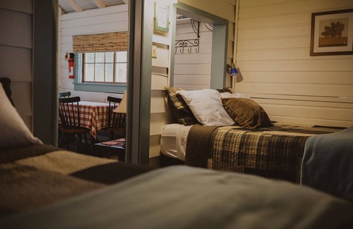 Seeley Lake Cabin | Thimbleberry is at Tamaracks Resort, with a screened-in porch facing the lake.