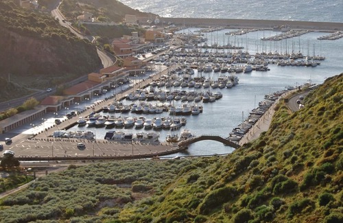 Castelsardo Apartment | This apartment is located in a residential complex in front of the tourist port of Castelsardo, in S