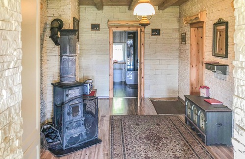 Mirsk House | This attractive and comfortable vacation home with a beautiful view of the mountains and the forest