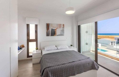 Softades House | This brand-new villa, situated on an exclusive gated development with landscaped gardens, is only mi