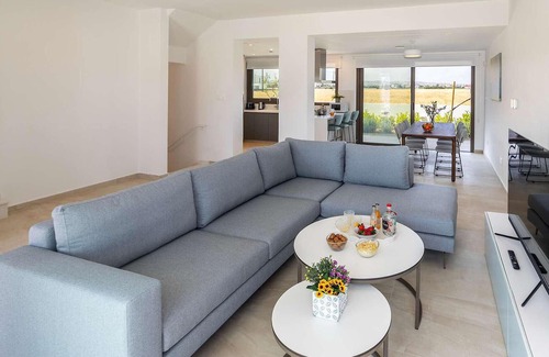 Softades House | This brand-new villa, situated on an exclusive gated development with landscaped gardens, is only mi