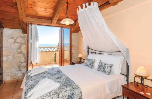 Xirokastello House | This charming stone villa sits in a prime coastal location, set down off the main coastal road leadi