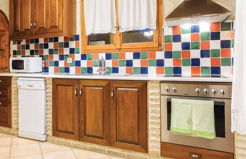 Xirokastello House | This charming stone villa sits in a prime coastal location, set down off the main coastal road leadi