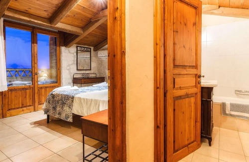 Xirokastello House | This charming stone villa sits in a prime coastal location, set down off the main coastal road leadi