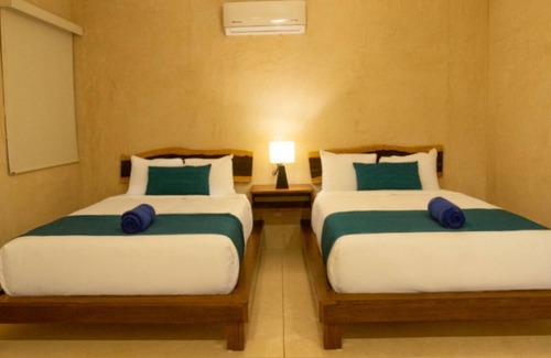 Tulum Hotel | This comfortable room is a great option for a romantic escape in Tulum.