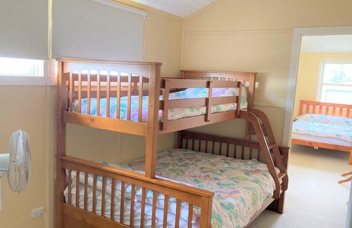 Tin Can Bay House | This comfy cottage is centrally located and waking distance to the Marina
