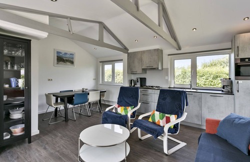 Ouddorp House | This delightful detached bungalow is peacefully located in a small holiday park, close to the beach.