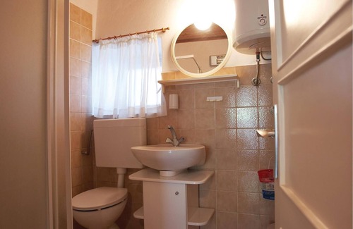 Gondolici Apartment | This functionally furnished apartment is located on a hill with a beautiful view of the sea and the