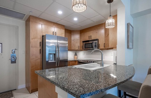 Vernon Condo | This ground-floor unit overlooks the quiet greenspace at the side and comes fully furnished!