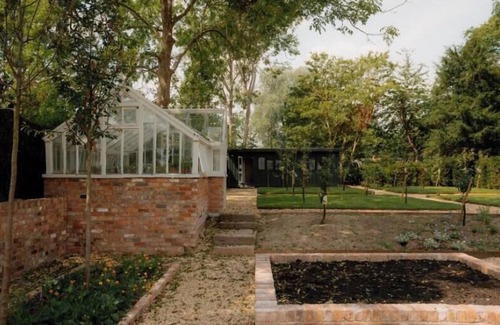 Bunbury House | This historic building offers an inviting retreat with its charming blend of comfort and elegance.