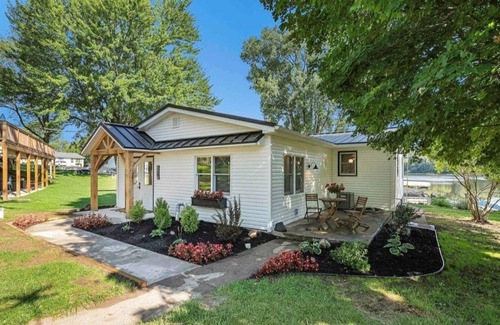 North Webster House | This house is located on North Webster Lake and features a hot tub.