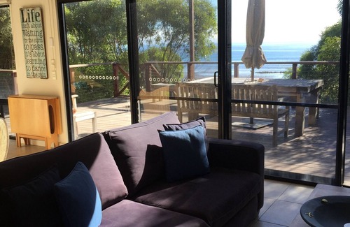 Emu Bay House | This luxury beachfront home shares the sand dune with Little Penguins