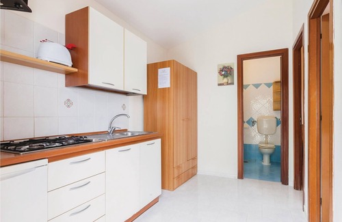 Monte Chiaro Apartment | This modern bungalow belongs to a vacation home complex directly above the sea, with a unique panora